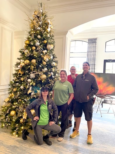 Natura team standing by professional Christmas Tree Installation